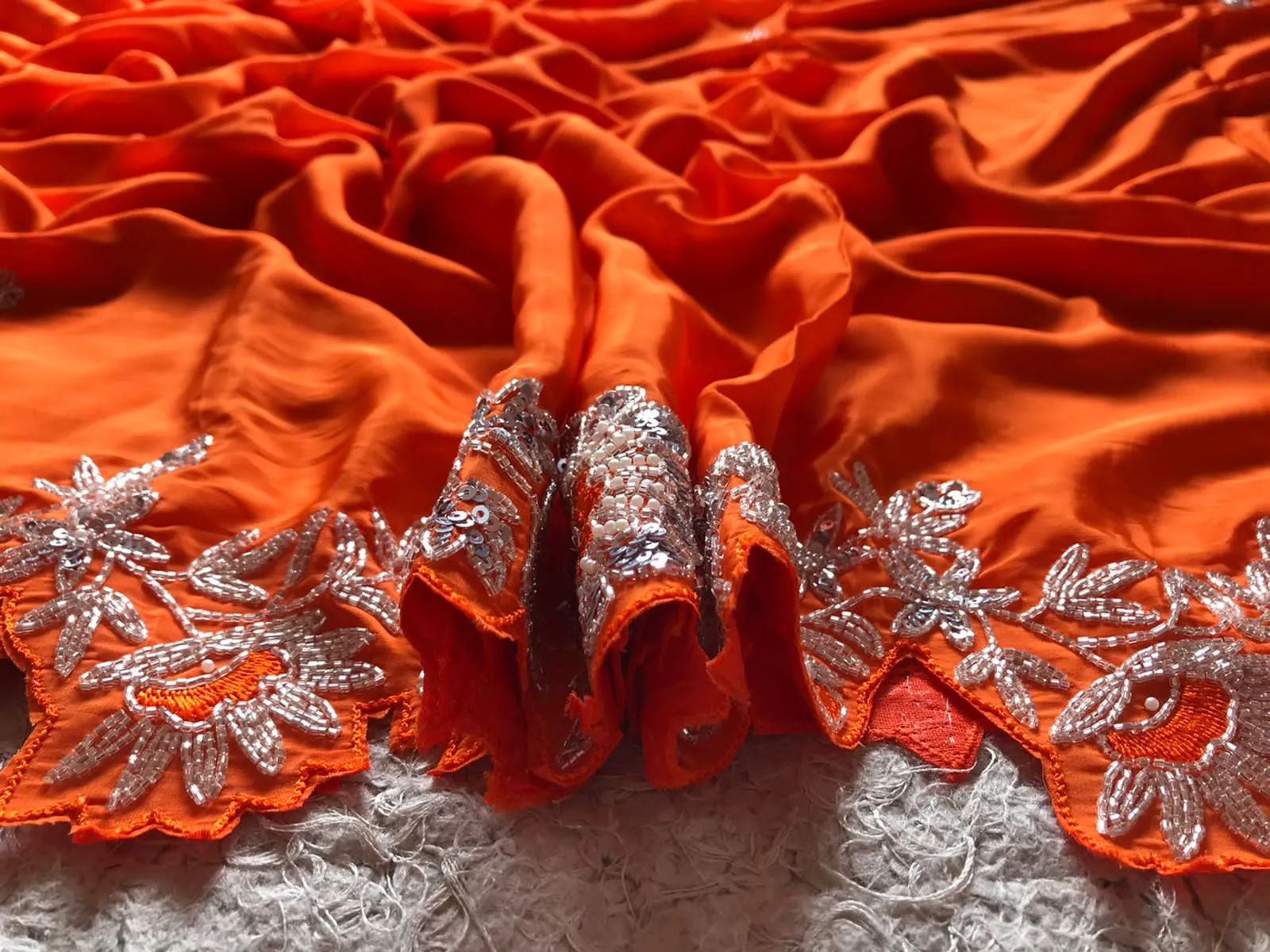 Preety orange organza silky saris